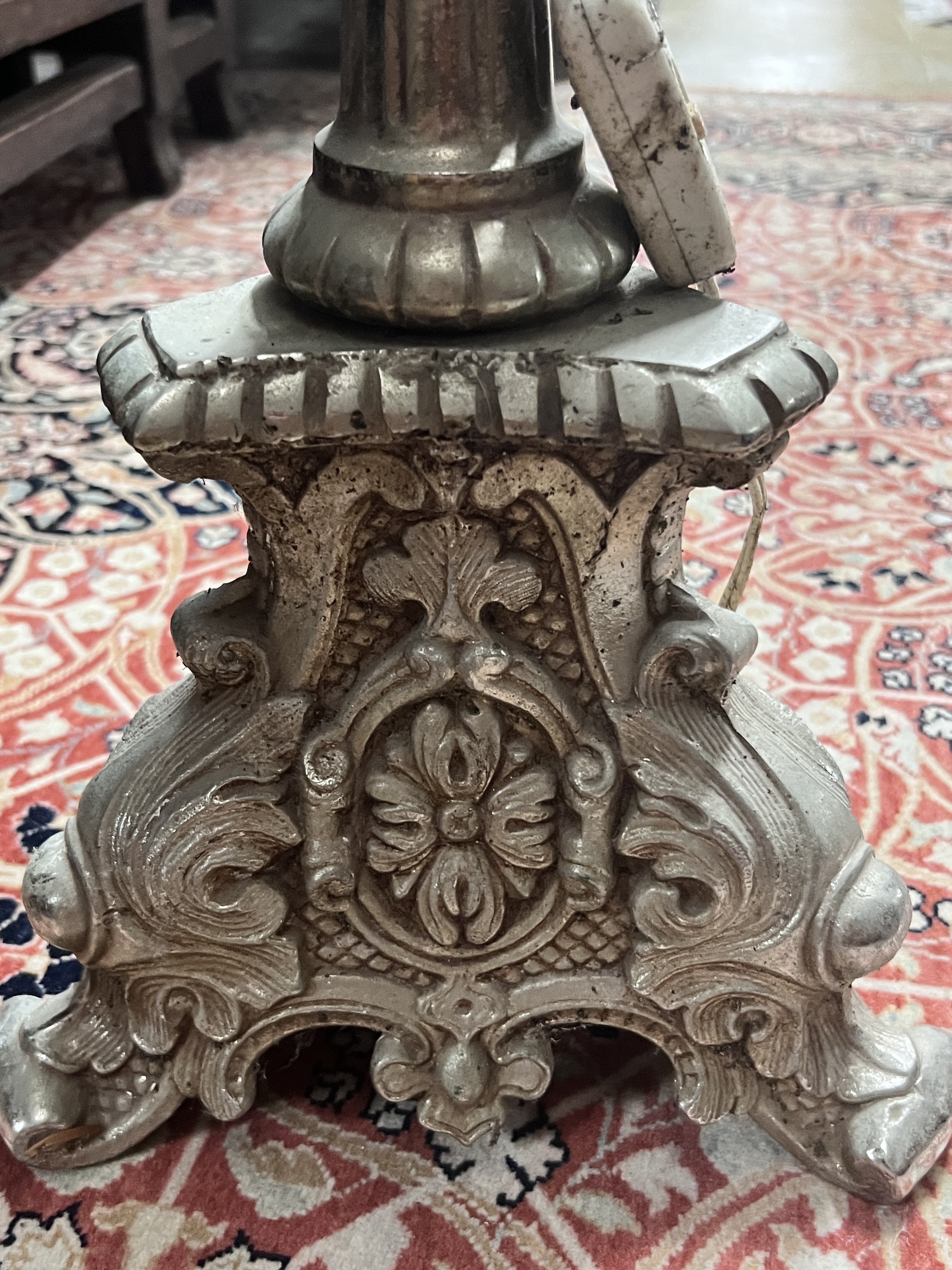 An Italian style cast metal standard lamp, height 165cm